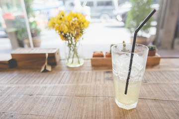 Fruit Juice on a Wood Table in Coffee Shop