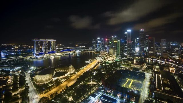 4k aerial time lapse of night scene at Singapore city skyline. 