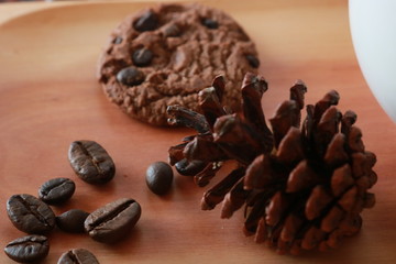 a cup of cappucino coffe on a table ready to drink