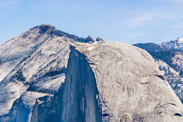 View towards the top of Half Dome in Yosemite National Park; Clouds Rest peak visible in the background, Sierra Nevada mountains, California