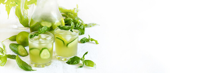 cold drink with basil, cucumber and lime. Mojito, lemonade with basil. copy space. banner