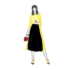 街中でコーヒーを飲む若い女性