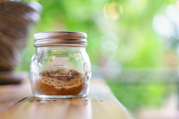 Raw brown sugar from cane in the bottle
