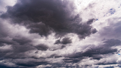 Naklejka na ściany i meble Dramatic thunder clouds in the sky.