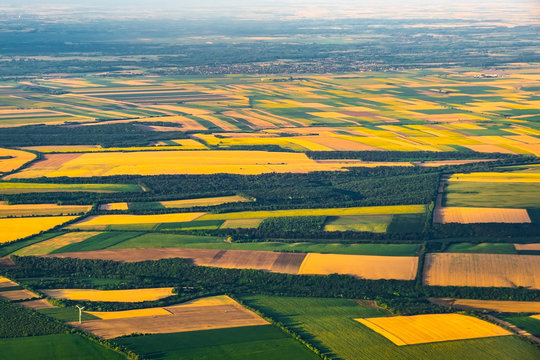 Aeriall View Of Patchwork Of  Yellow And Green Fields In China