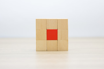 Wooden blocks stacked into rectangular shapes without graphics.