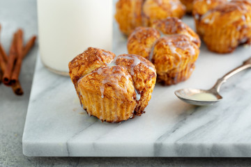 Cinnamon sugar monkey bread muffins with creamy glaze