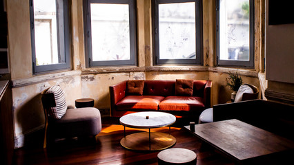 Old-fashioned sitting living room with antique furniture in vintage space design