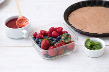 Organic Mixed Berries in glass bowl for dressing on pancake
