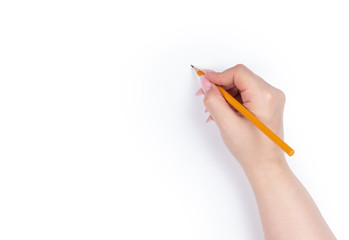 Female hand holding pencil, isolated on white 