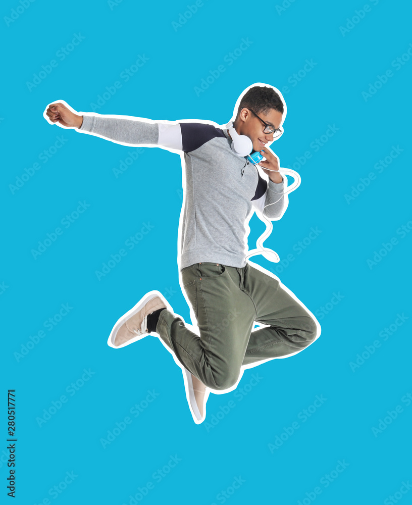 Canvas Prints Portrait of jumping African-American teenage boy on white background