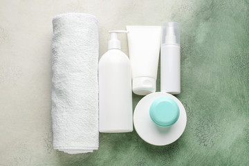 Set of cosmetic products on color background