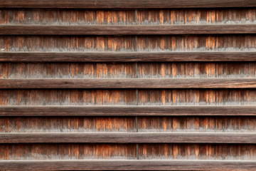 Texture of old wood japanese art of outsite temple wall.