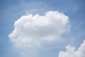 white clouds on a blue sky background