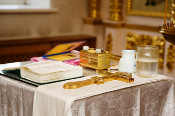 Acrament of orthodox baptism in the temple. Accessories for baptism