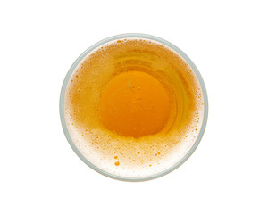 beer bubbles in glass cup on white background. top view.