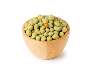 wasabi crispy peanut snack balls in a wooden cup isolated on white background.