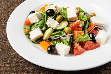 greek salad on the white plate