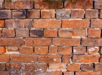 Weathered old brick wall