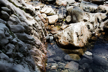 Mountain Creek. Stones big and small. Sunny beautiful day. Autumn.