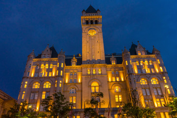 Fototapeta premium Illuminated Old Post Office Building Evening Washington DC