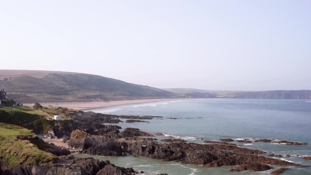 Aerial Flyover of a Beautiful Sandy Beach in North Devon on a Summer&rsquo;s Morning