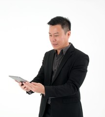 Portrait of businessman look at tablet to search information isolated on white background