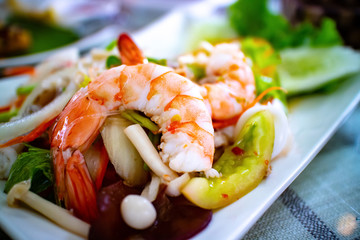 Spicy jelly noodle salad with seafood. One of signature Thai food.