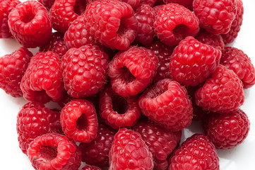 Delicious fresh ripe raspberries on white background
