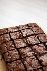Homemade chocolate brownies, low angle view. Copy space.