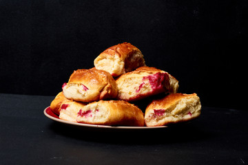 Buns with fruit. Homemade baking. Homemade Buns on plate