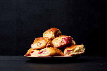 Buns with fruit. Homemade baking. Homemade Buns on plate