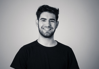 Human expressions and emotions. Joyful young attractive man smiling with happy face