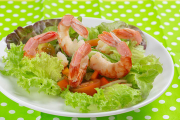 Fresh vegetable salad with shrimp prawn. Boiled peeled headless shrimps