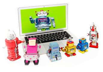 big silver robot talking to kid robots