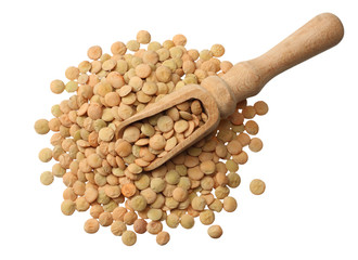 Pile lentil in wooden spoon isolated on white background. Top view.