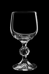 Silhouette of a glass wine glass on a black background