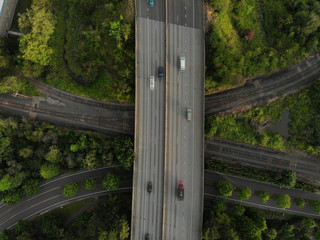 Photo of a road junction with cars and landscape top view, texture for design