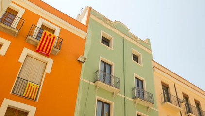 Fototapeta na wymiar Balconies in Catalonia with the flag of independence.