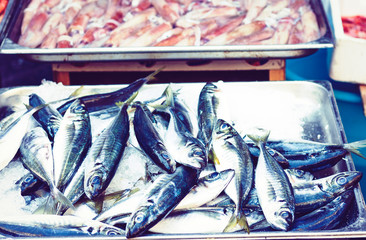 Fresh seafood and fish for sale in the fish market Pescheria of Catania, Sicily, Italy.