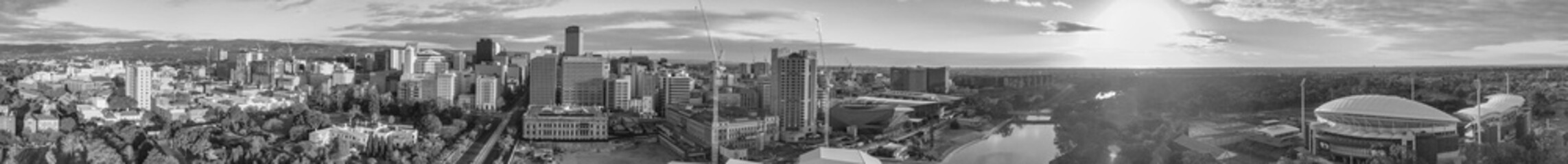 Fototapeta na wymiar ADELAIDE, AUSTRALIA - SEPTEMBER 16, 2018: Aerial view of city skyline at sunset. Adelaide is the main city of South Australia State