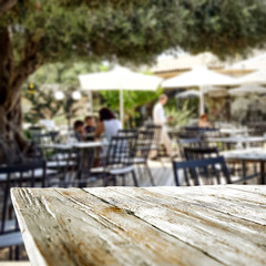 Table background  in a outdoor restaurant view. Empty  space for your decoration and advertising products.