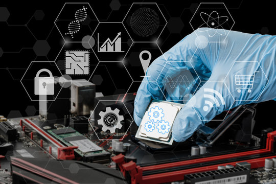 Someone's hand put a CPU computer intio mainboard..