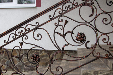 forged railings,twisted metal railings on the stairs to the house