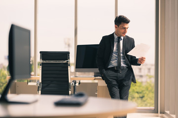 Fototapeta premium Side view image of Caucasian businessman..
