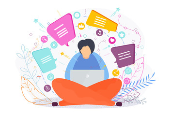 Man writes online chat messages on a laptop.