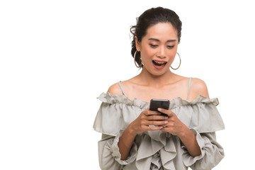 Beautiful Asian woman using smartphone..