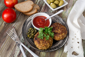 Cutlets with rice and minced meat