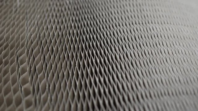 Review of a honeycomb paper. Building and packing material. Strong and light insert for doors. Lighter furniture. Lowering costs of production.