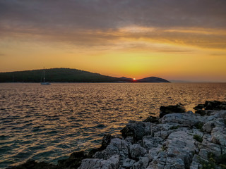 Beautiful evenin by the sea with wonderful sunset reflecting in sea water.